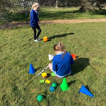 students preparing an outdoors game